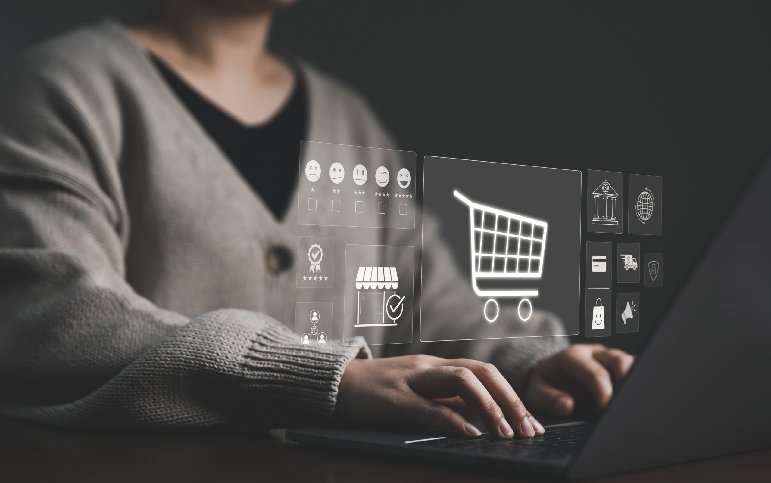 Close up of a person using a laptop with e-commerce and retail data icons overlaid.