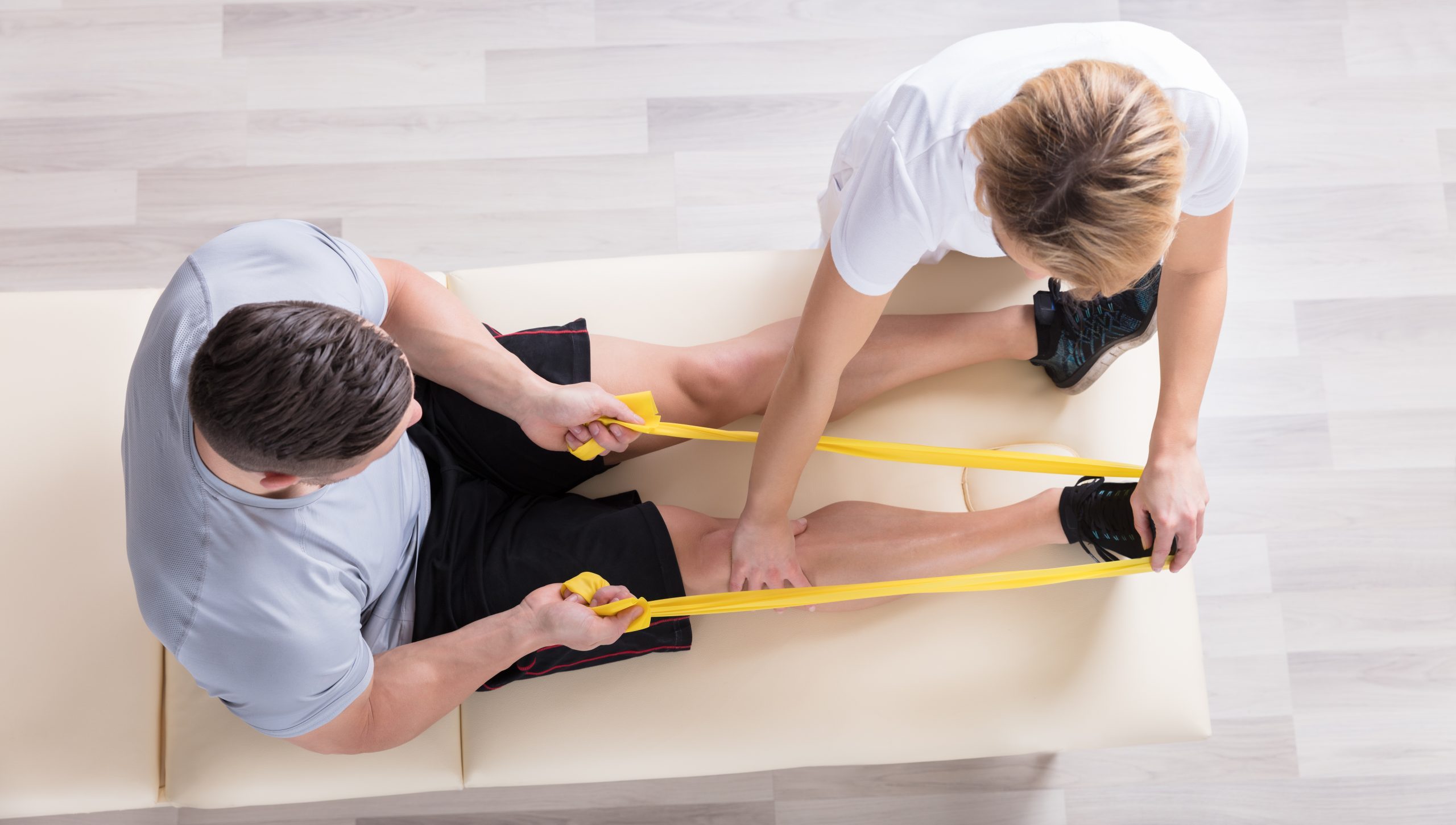 Image of a Physical Therapist assisting a patient for Empower Physical Therapy Group